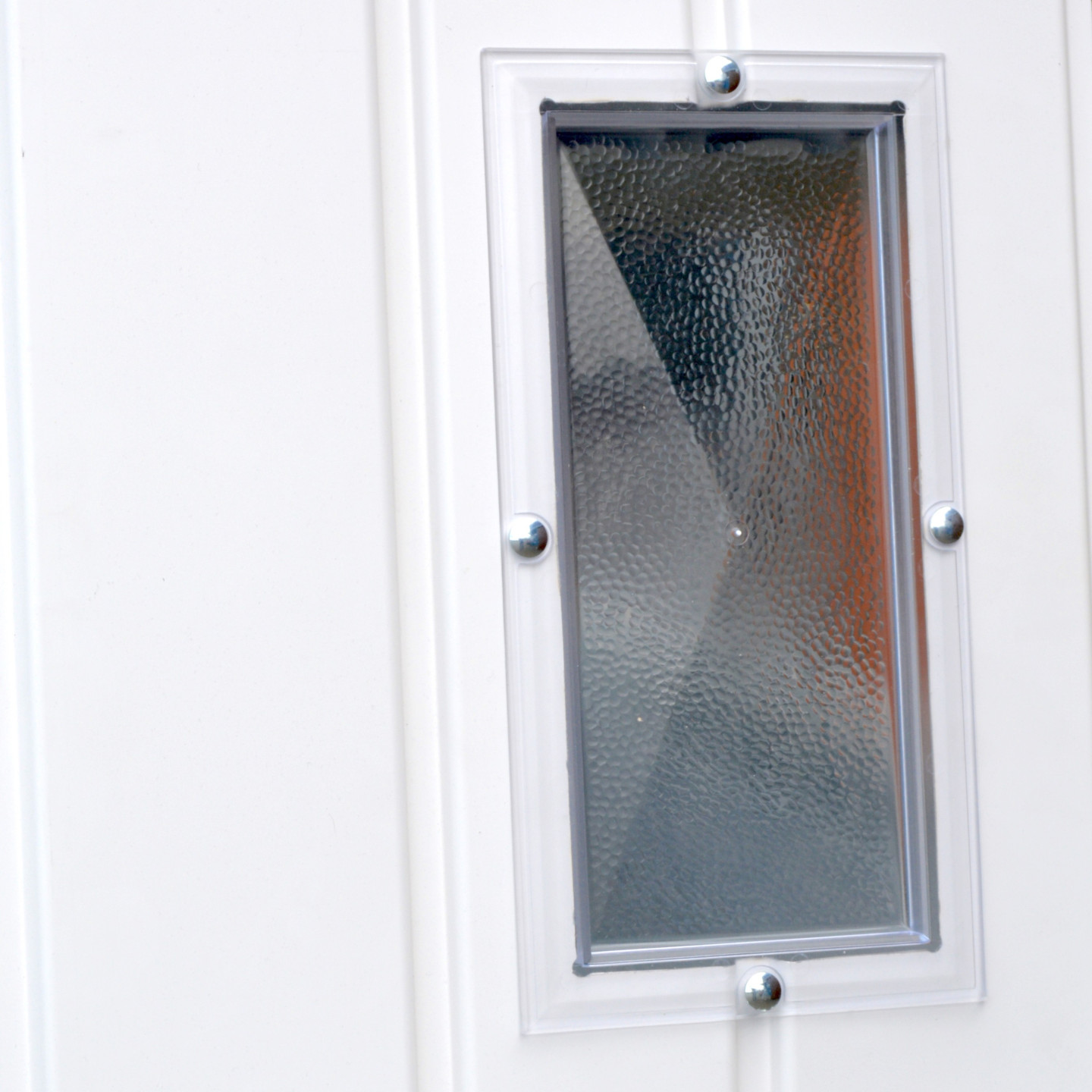 Hublot PVC pour porte basculante