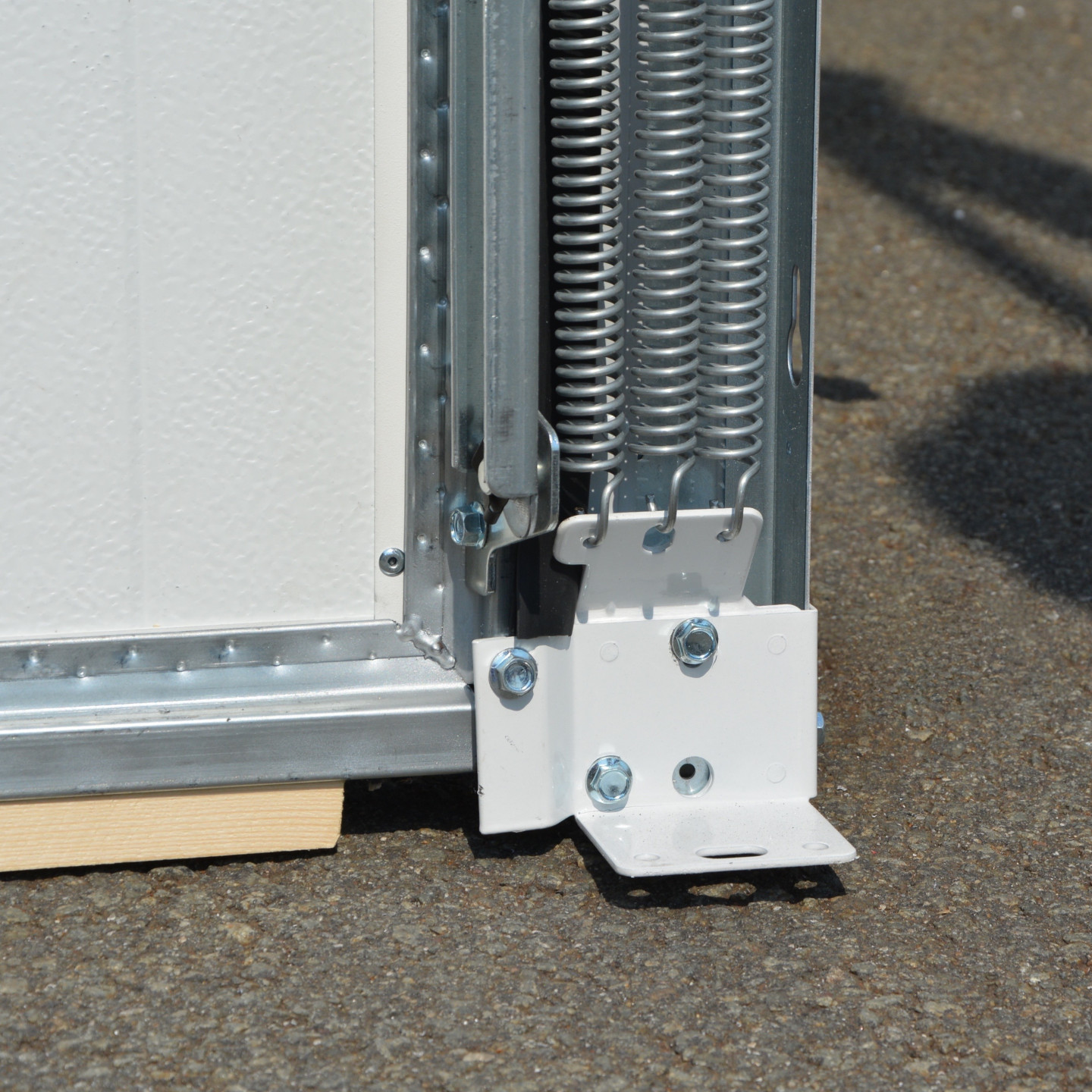 Équilibrage par un système multi-ressorts de chaque coté de la porte