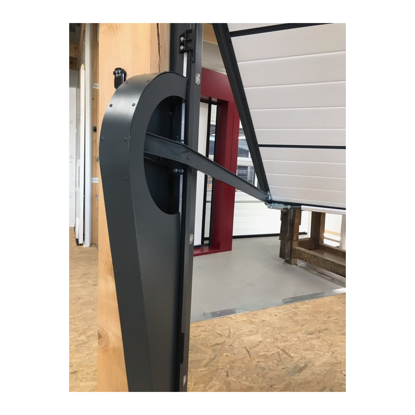 Bras reforcé de porte de garage basculante